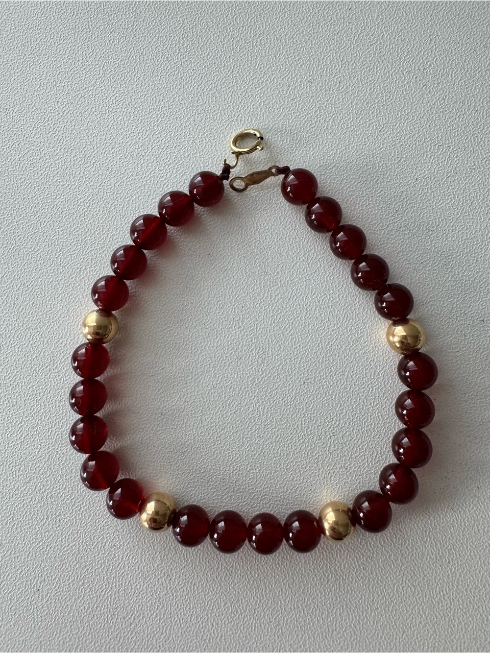 Red Beaded Bracelet with Gold Accent Beads